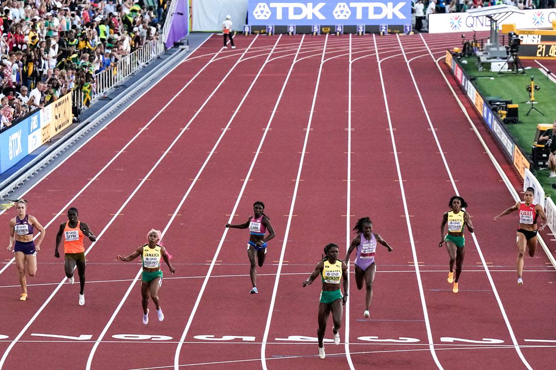 Shericka Jackson of Jamaica wins the women’s 200 meters in meet-record time in Eugene, Oregon, on Thursday night. Former Kentucky star Abby Steiner, far left, finished fifth.