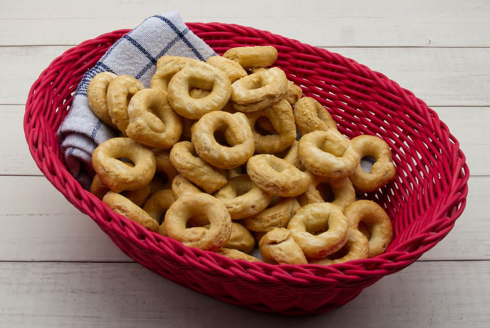 Taralli alla pugliese with extra virgin olive oil. Traditional Italian snack Taralli