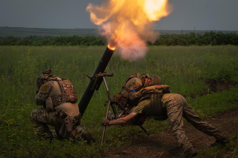 Ukrainian soldiers fire toward Russian position on the frontline in Zaporizhzhia region, Ukraine, Saturday, June 24, 2023.