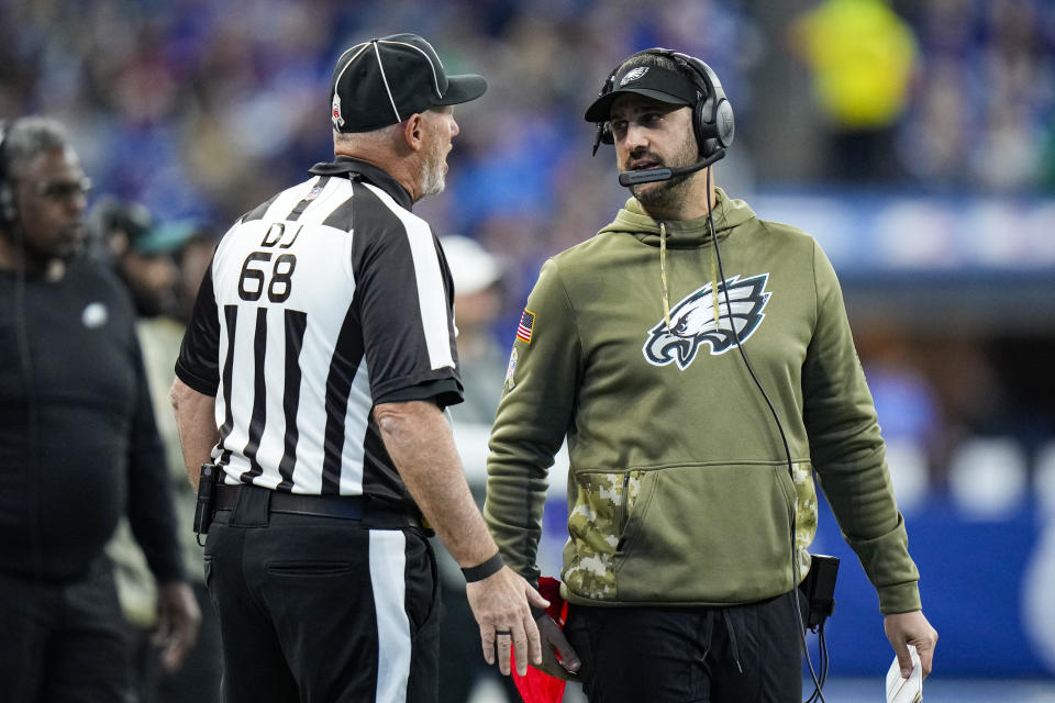 Philadelphia Eagles head coach Nick Sirianni talks with down judge Tom Stephan in the first half of an NFL football game against the Indianapolis Colts in Indianapolis, Sunday, Nov. 20, 2022. (AP Photo/AJ Mast)