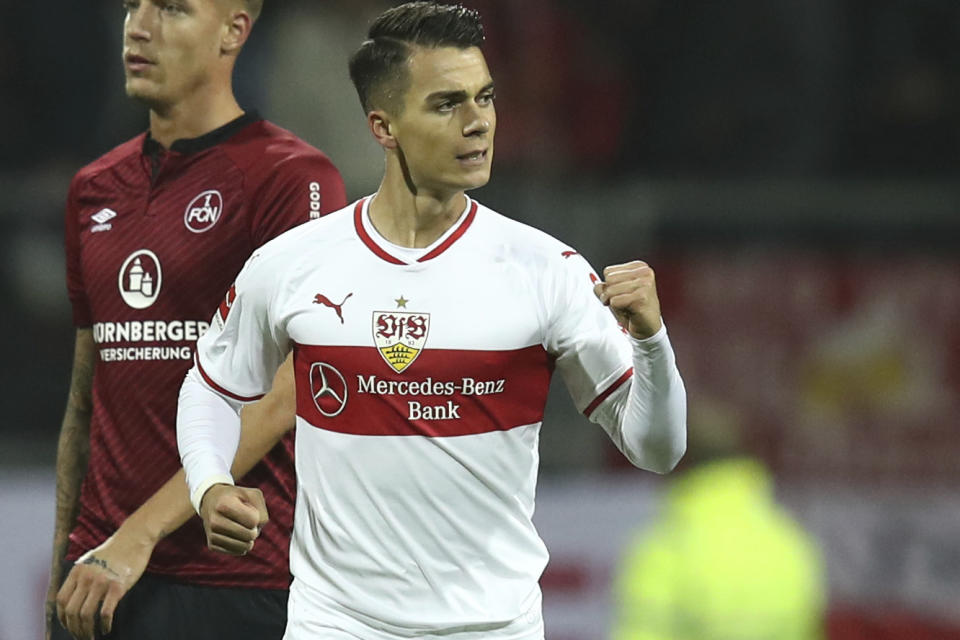 Stuttgart's Erik Thommy celebrates after scoring during the German Bundesliga soccer match between 1. FC Nuernberg and VfB Stuttgart in Nuremberg, Germany, Saturday, Nov. 10, 2018. (Daniel Karmann/dpa via AP)