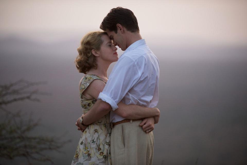 claire foy as diana cavendish, andrew garfield as robin cavendish hugging in movie breathe