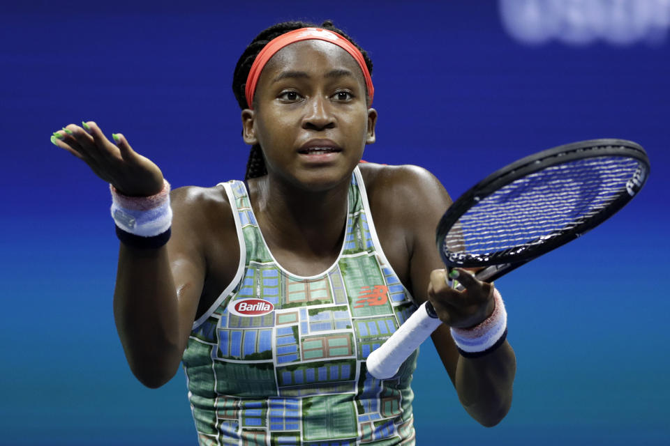 Coco Gauff, of the United States, reacts during her match against Naomi Osaka, of Japan, during the third round of the U.S. Open tennis tournament Saturday, Aug. 31, 2019, in New York. (AP Photo/Adam Hunger)
