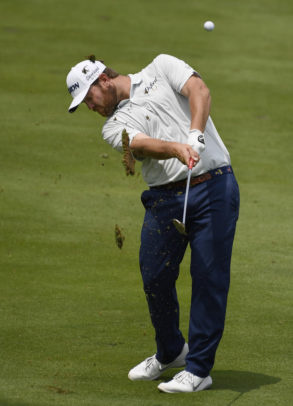 Zack Sucher hits a shot on the first hole during the third round of the Travelers Championship golf tournament, Saturday, June 22, 2019, in Cromwell, Conn. (AP Photo/Jessica Hill)