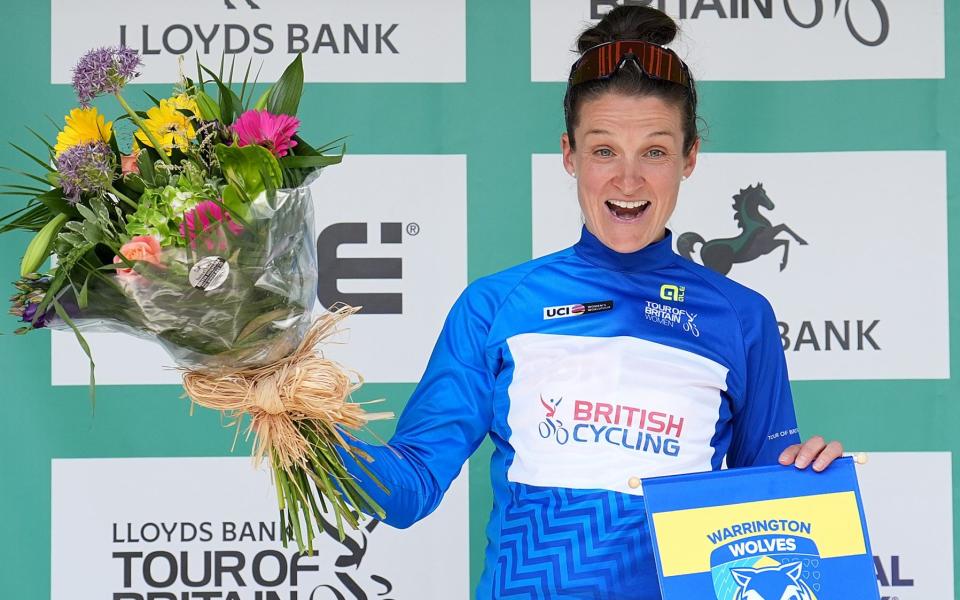 Lizzie Deignan celebrates with the Queen of the Mountains jersey