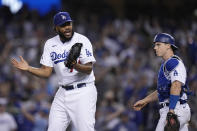 Los Angeles Dodgers pitcher Kenley Jansen reacts after getting the final out in the ninth inning against the Atlanta Braves in Game 3 of baseball's National League Championship Series Tuesday, Oct. 19, 2021, in Los Angeles. The Dodgers defeated the Braves 6-5. The Braves lead the series 2-1 games. (AP Photo/Jae Hong)