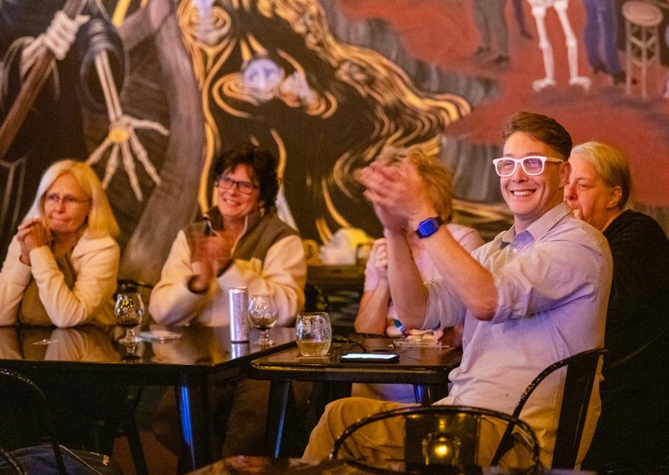 Kent Geddes and friends cheer at the end of Lavender Darcangelo’s performance Sept. 26 on "America’s Got Talent," which they watched at at River Stix Brewing.