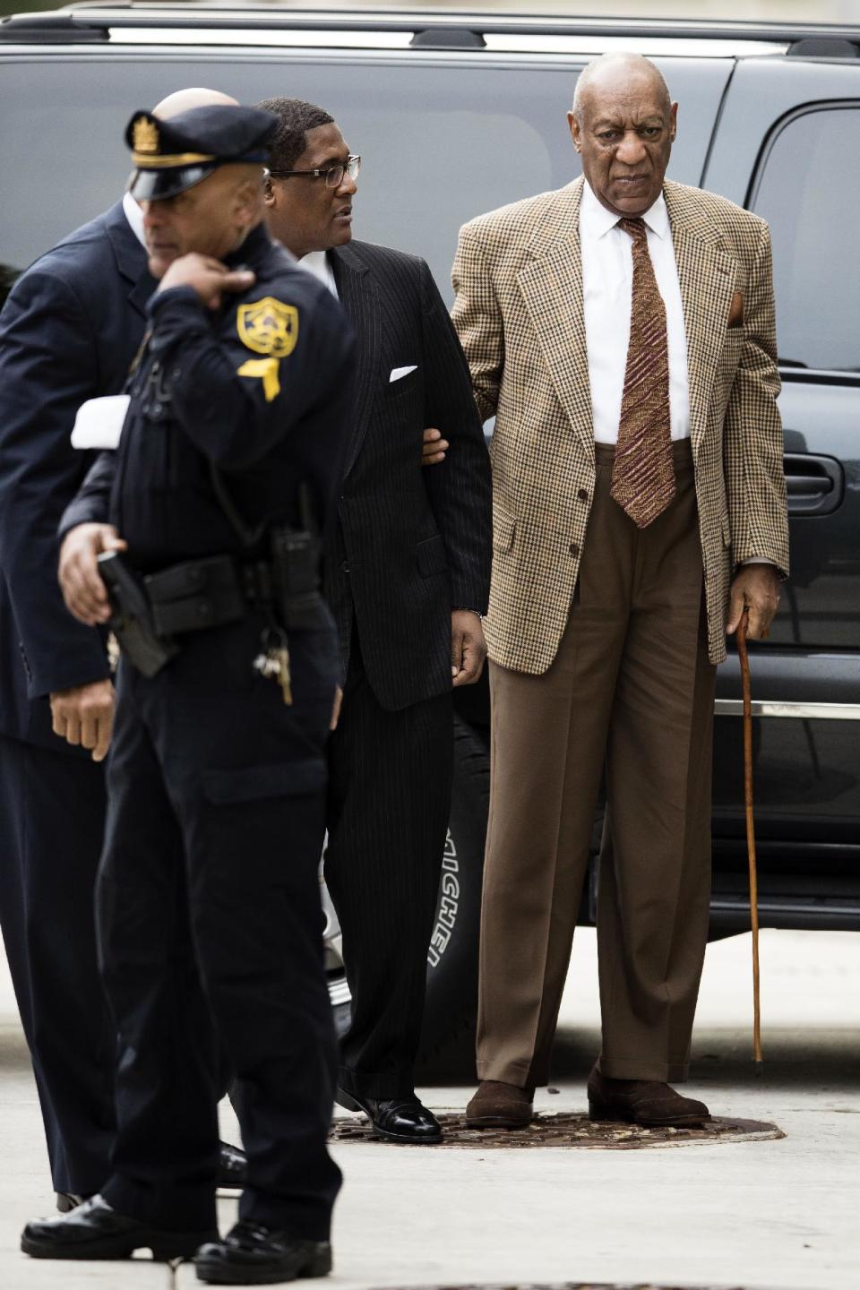 Bill Cosby arrives for a pretrial hearing in his sexual assault case at the Montgomery County Courthouse in Norristown, Pa., Tuesday, Dec. 13, 2016. Lawyers for Cosby will battle in court to try to limit the number of other accusers who can testify at the comedian's sexual assault trial. (AP Photo/Matt Rourke)