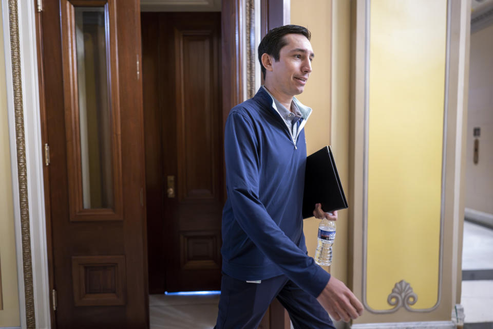 John Leganski, deputy chief of staff to House Speaker Kevin McCarthy, R-Calif., leaves the meeting room after negotiations on the debt limit with President Joe Biden's team came to an abrupt halt, at the Capitol in Washington, Friday, May 19, 2023. (AP Photo/J. Scott Applewhite)