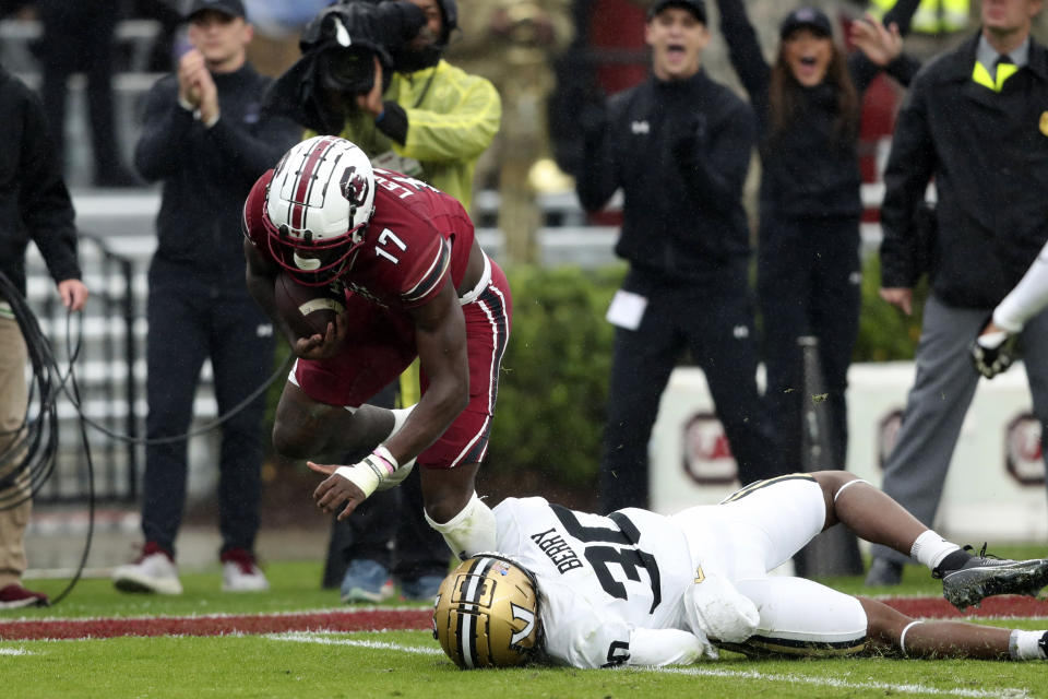 South Carolina wide receiver Xavier Legette (17) is tackled by Vanderbilt cornerback Trudell Berry (30) at the 1-yard line during the first half of an NCAA college football game on Saturday, Nov. 11, 2023, in Columbia, S.C. (AP Photo/Artie Walker Jr.)