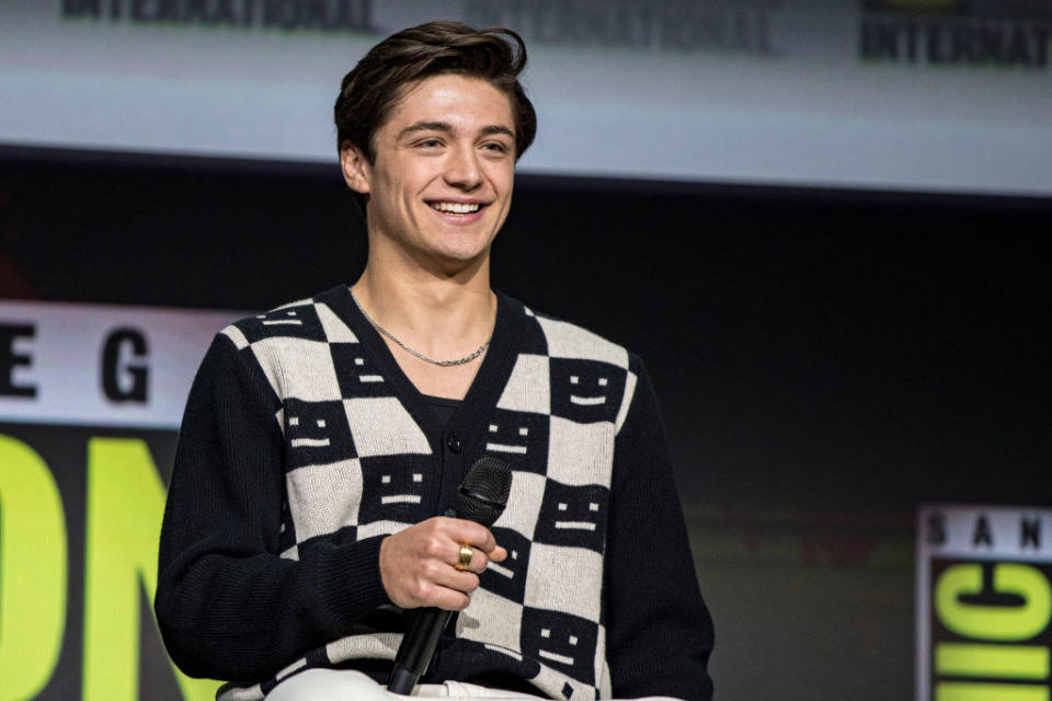 Asher Angel speaks onstage at the Warner Bros. theatrical panel