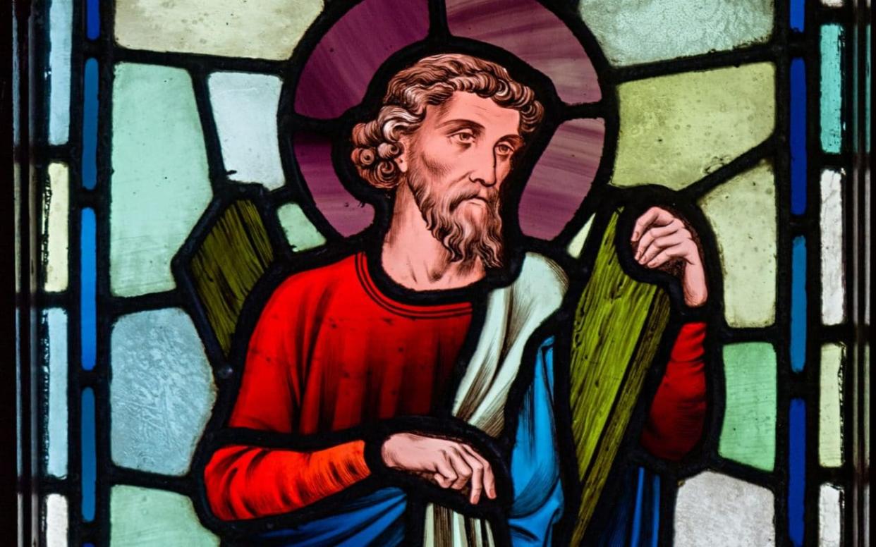 A stained glass depiction of St Andrew, the patron saint of Scotland - www.alamy.com