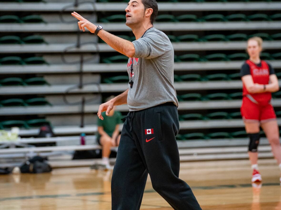 Canadian women's basketball coach Victor Lapeña is seen above in Edmonton during training camp ahead of the World Cup. Lapeña hopes to elevate the team to the Olympic podium by restoring joy. (Submitted by Canada Basketball - image credit)