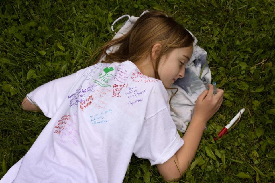 <strong>Camper Amelia Smith.</strong> "<a href="https://time.com/6286420/suicide-bereavement-camps-kids/" rel="nofollow noopener" target="_blank" data-ylk="slk:As Suicide Rates Rise, Bereavement Camps Bring Healing to Kids Left Behind,;elm:context_link;itc:0;sec:content-canvas" class="link ">As Suicide Rates Rise, Bereavement Camps Bring Healing to Kids Left Behind,</a>" July 12 issue.<span class="copyright">Ilona Szwarc for TIME</span>