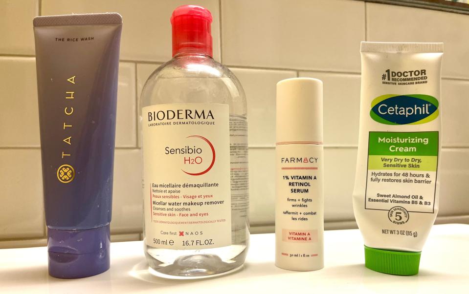 Tatcha The Rice Wash, Bioderma Sensibio H20 Micellar Water Makeup Remover, Farmacy 1% Vitamin A Retinol Serum, and Cetaphil Moisturizing Cream.