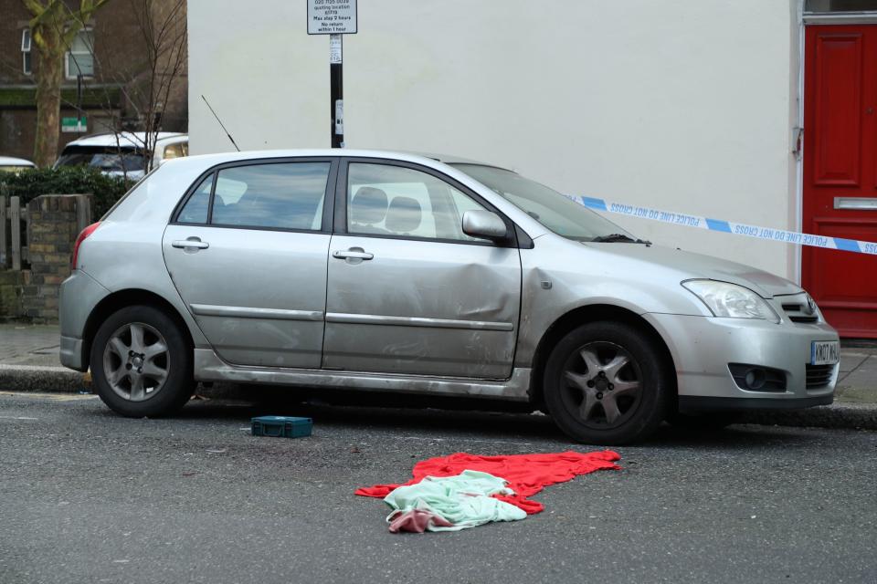 Metropolitan police cordon off Charteris Road close to the junction with Lennox Road in Finsbury Park in north London where the stabbing happened (PA)