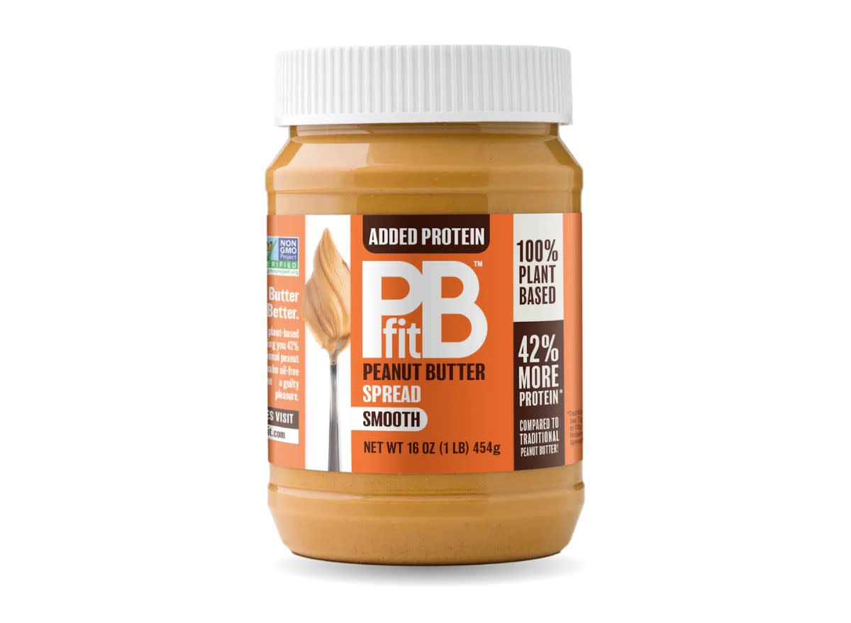 bar of PB fit peanut butter spread on a white background