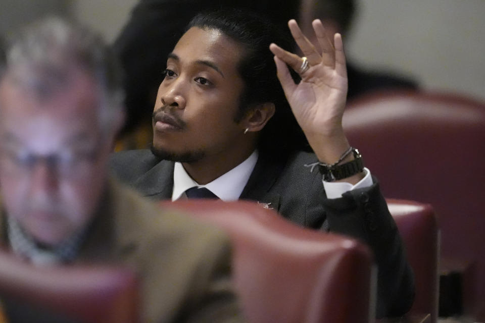 Rep. Justin Jones, D-Nashville, raises his hand to be recognized on the House floor during a legislative session Monday, Feb. 26, 2024, in Nashville, Tenn. (AP Photo/George Walker IV)