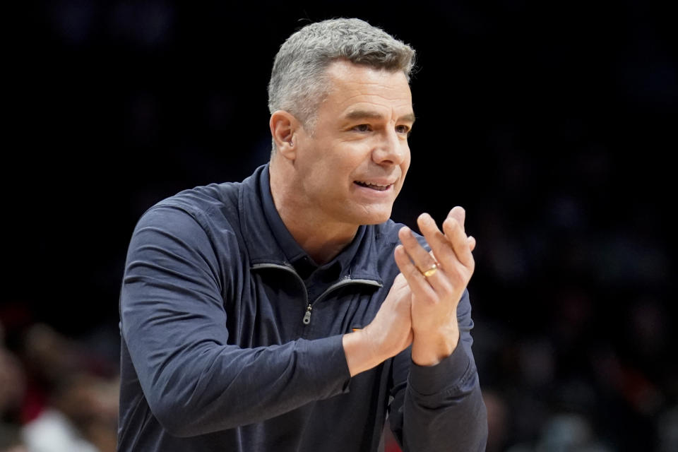 FILE -Virginia head coach Tony Bennett works the bench in the second period of an NCAA college basketball game against Louisville during the Atlantic Coast Conference men's tournament, Wednesday, March 9, 2022, in New York. Virginia hasn’t won an NCAA Tournament game since its 2019 national title and failed to even make the field last season. “This probably is the oldest team maybe that I’ve had,” coach Tony Bennett said as he enters his 14th season at Virginia. (AP Photo/John Minchillo, File)