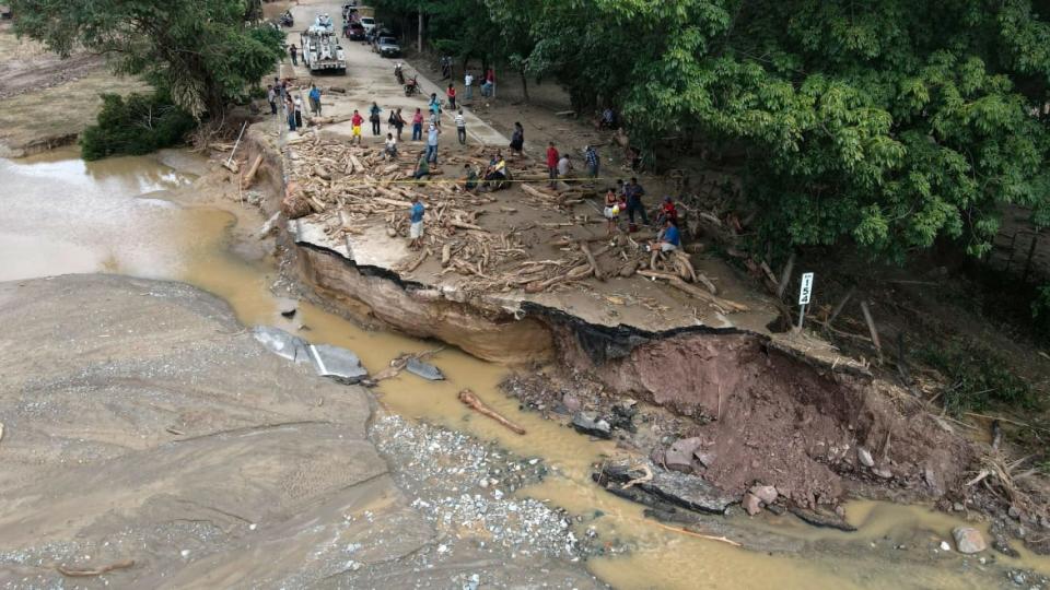 <div class="inline-image__caption"><p>Hurricane Eta detroyed a road in Gualan, Zacapa department. </p></div> <div class="inline-image__credit">CARLOS ALONZO/Getty</div>