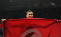 LONDON, ENGLAND - AUGUST 06: Habiba Ghribi of Tunisia celebrates winning silver after the Women's 3000m Steeplechase final on Day 10 of the London 2012 Olympic Games at the Olympic Stadium on August 6, 2012 in London, England. (Photo by Michael Regan/Getty Images)