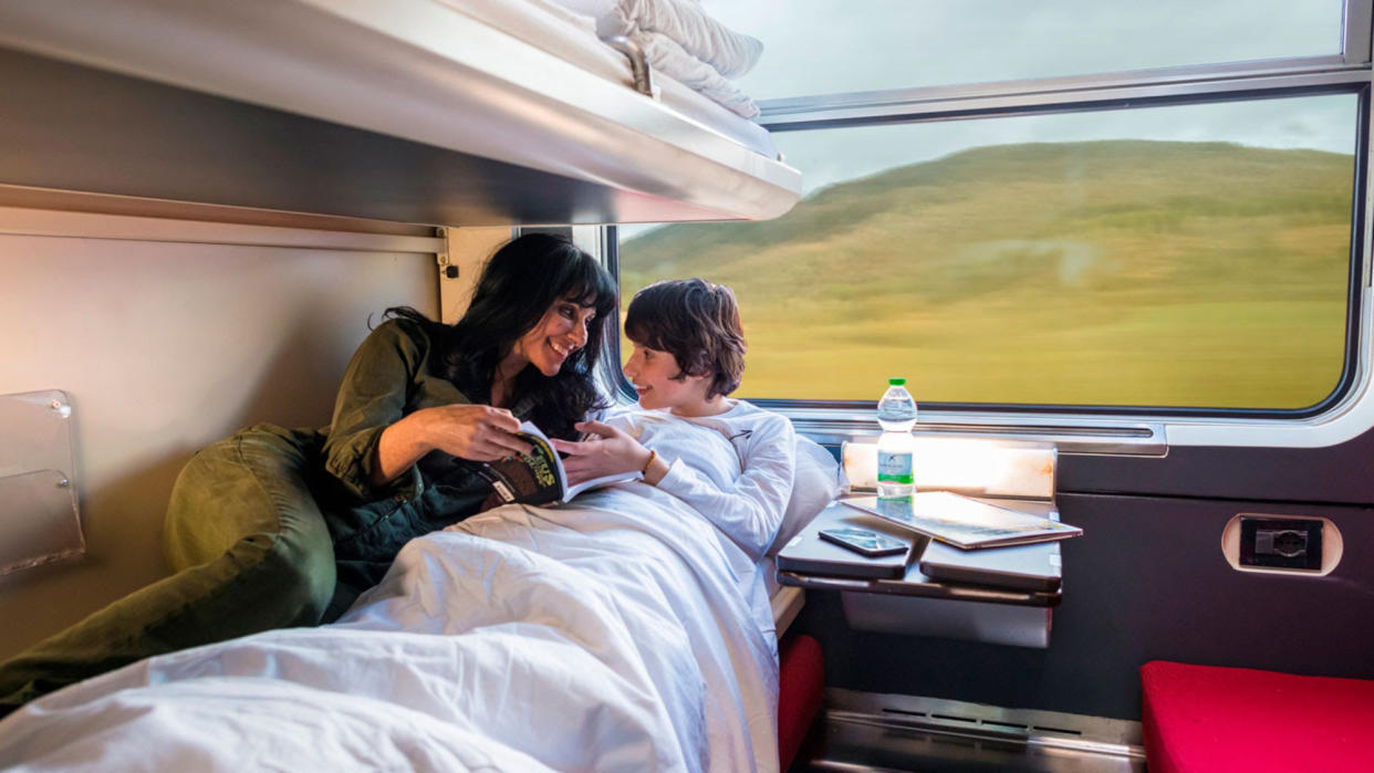  Woman and child in sleeper train. 