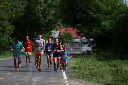 Muay Thai boxer Nong Rose Baan Charoensuk, 21, who is transgender, trains near a gym in Buriram province, Thailand, July 3, 2017. REUTERS/Athit Perawongmetha