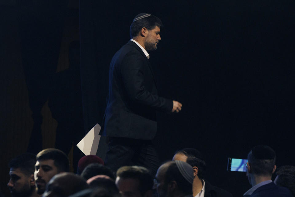 Israeli Finance Minister Bezalel Smotrich leaves the stage at the conference Sunday. (Kobi Wolf for NBC News)