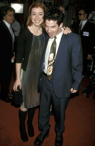 <p>Jim Smeal/Ron Galella Collection via Getty</p> Alyson Hannigan and Seth Green in 1998