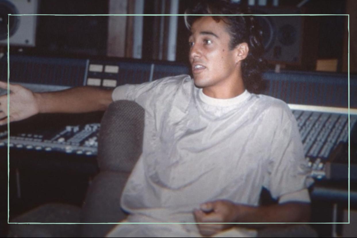  An old photograph of Andrew Ridgeley in a recording studio 