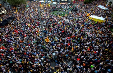Pro-independence demonstrators gather to mark one year of the Spanish police raid and protest which lead to the imprisonment of the leaders of Catalonia's main pro-independence movements in Barcelona, Spain, September 20, 2018. REUTERS/Stringer