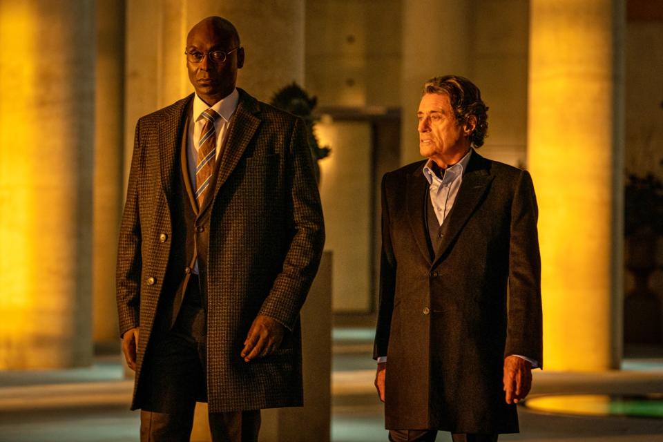 Lance Reddick, left, with Ian McShane in ‘John Wick: Chapter 4’