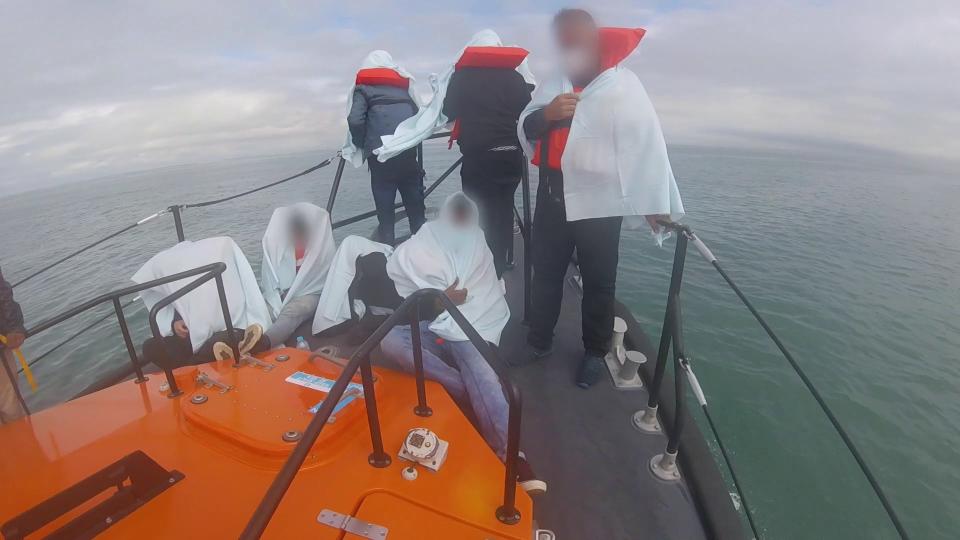 Footage taken in July 2021 of migrants being rescued by the RNLI (RNLI/PA) (PA Media)