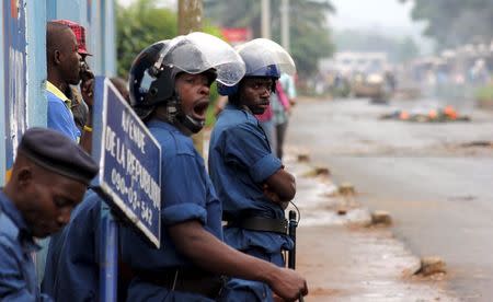 Riot policemen stand along a street during protests in Burundi's capital Bujumbura, May 5, 2015. REUTERS/Jean Pierre Aime Harerimana