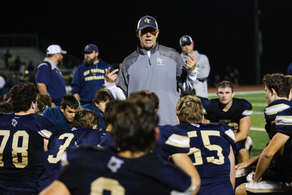 Old Tappan coach Brian Dunn addresses his football team after a 37-14 win over Sparta.