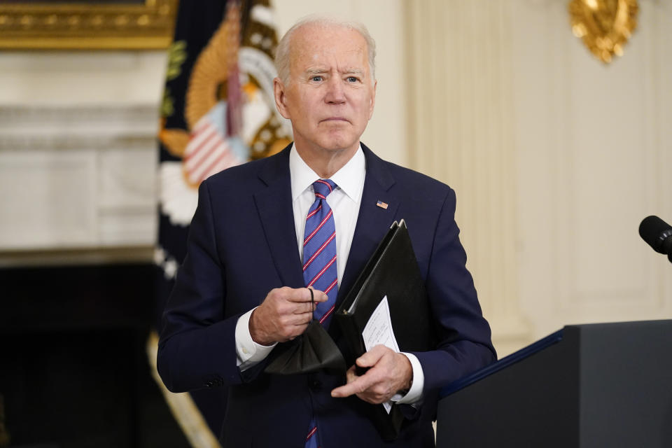 President Joe Biden leaves after speaking about the March jobs report in the State Dining Room of the White House, Friday, April 2, 2021, in Washington. (AP Photo/Andrew Harnik)