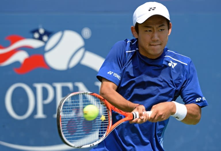 Japan's Yoshihito Nishioka hits a return to France's Paul-Henri Mathieu during their US Open match at the USTA Billie Jean King National Center on September 1, 2015