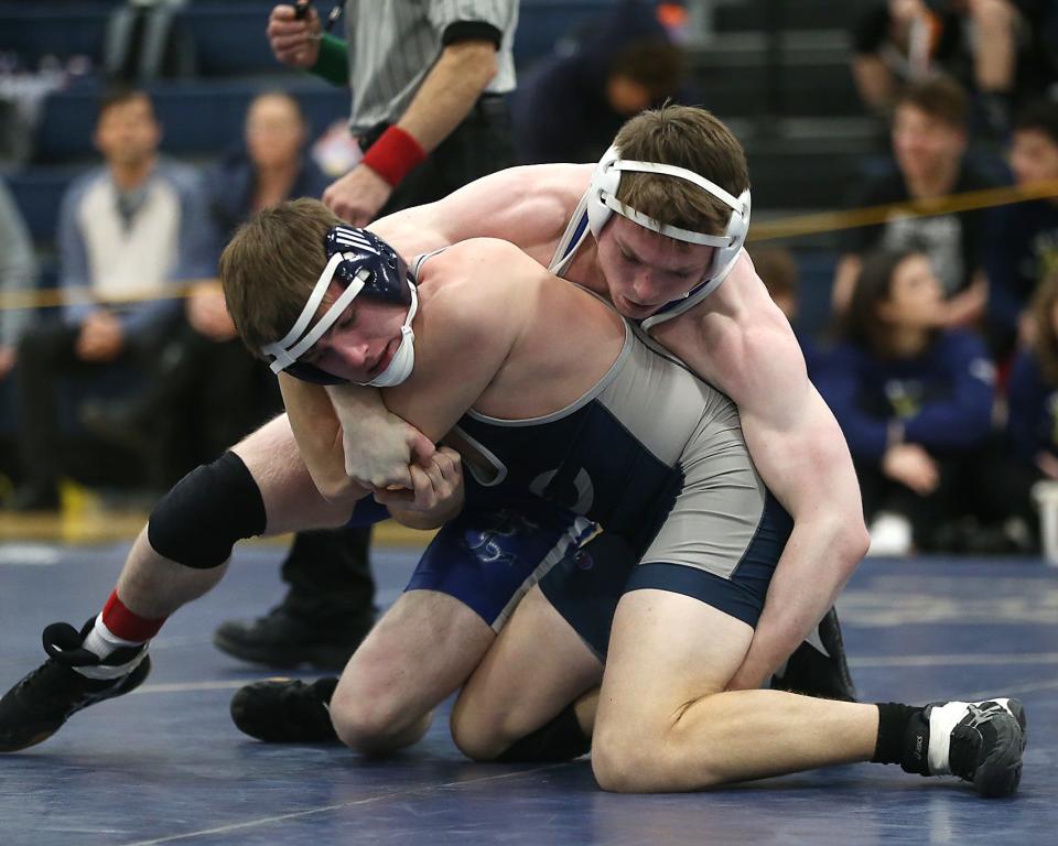 Scituate’s David Murphy (152 lbs) has a hold of Cohasset’s Dean Livermore.during the Cohasset Wrestling Tournament at Cohasset High on Saturday, Jan. 21, 2023. 