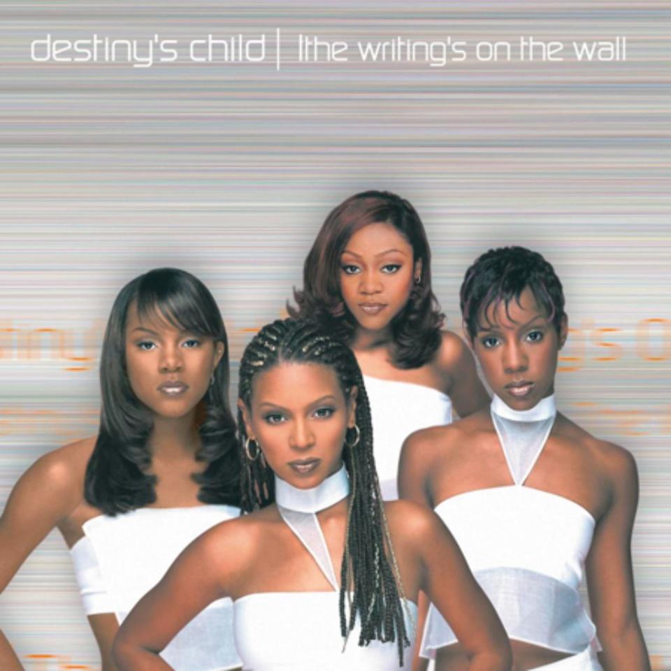 The cover of Destiny’s Child’s 1999 album “The Writings On The Wall,” with members in futuristic tops that were ubiquitous at the time. - Credit: Courtesy