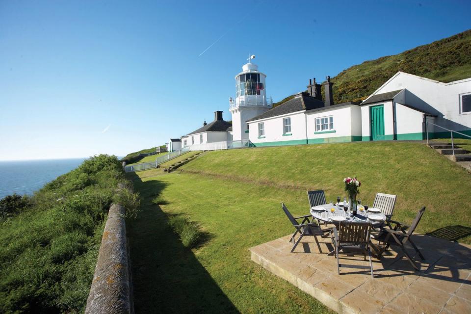 <p>It was from Whitby’s harbour that Captain Cook embarked upon his voyage of discovery to Australia aboard HMS Endeavour in 1768. Ninety years later, the architect behind the West Usk Lighthouse also designed <a href="https://www.trinityhouse.co.uk/lighthouses-and-lightvessels/whitby-lighthouse" rel="nofollow noopener" target="_blank" data-ylk="slk:Whitby’s white octagonal tower;elm:context_link;itc:0;sec:content-canvas" class="link ">Whitby’s white octagonal tower</a>.</p><p>As you’d expect with any seaside town, the fish-and-chip shop competition is pretty fierce. One of Whitby’s oldest fishmongers is <a href="http://www.fortuneskippers.co.uk/" rel="nofollow noopener" target="_blank" data-ylk="slk:Fortune’s Kippers;elm:context_link;itc:0;sec:content-canvas" class="link ">Fortune’s Kippers</a>, whose legacy is almost older than the lighthouse.</p><p>Beyond Whitby’s jolly fishing village reputation, a menacing, Gothic shadow looms over it in the form of <a href="http://english-heritage.org.uk/whitby" rel="nofollow noopener" target="_blank" data-ylk="slk:Whitby Abbey;elm:context_link;itc:0;sec:content-canvas" class="link ">Whitby Abbey</a>, Shelley’s inspiration for Dracula. Clamber up the 199 steps and then recover your energy with fondant fancies at <a href="https://www.botham.co.uk/" rel="nofollow noopener" target="_blank" data-ylk="slk:Botham’s of Whitby;elm:context_link;itc:0;sec:content-canvas" class="link ">Botham’s of Whitby</a> (confectioners since 1865) or a spot of lunch at the <span>Magpie Café</span>.</p>