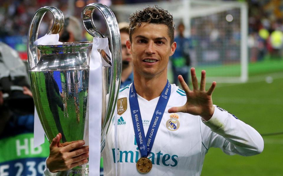 Real Madrid's Cristiano Ronaldo gestures as he celebrates winning the Champions League  - REUTERS