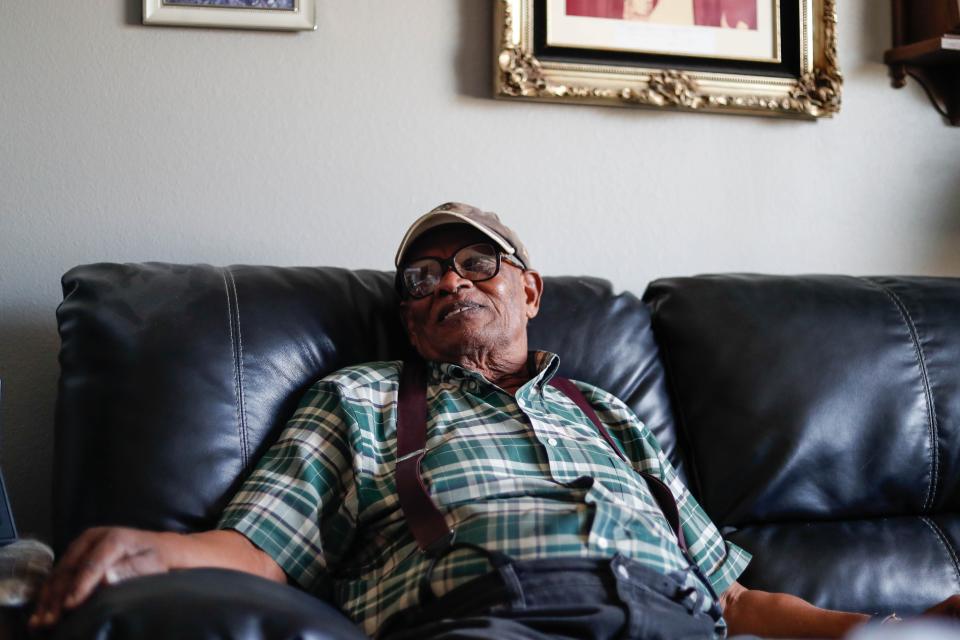 Jazz legend Julius Brooks sits in his home at Corinthian Gardens in Des Moines on Nov. 7. Brooks played on the road with Ray Charles, James Brown, Little Richard, the Four Tops, Louis Jordan and the Ink Spots.
