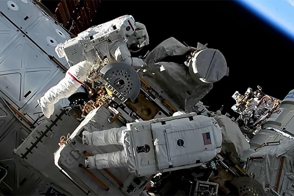 <p>NASA TV</p> NASA astronauts Jasmin Moghbeli and Loral O’Hara perform maintenance on International Space Station