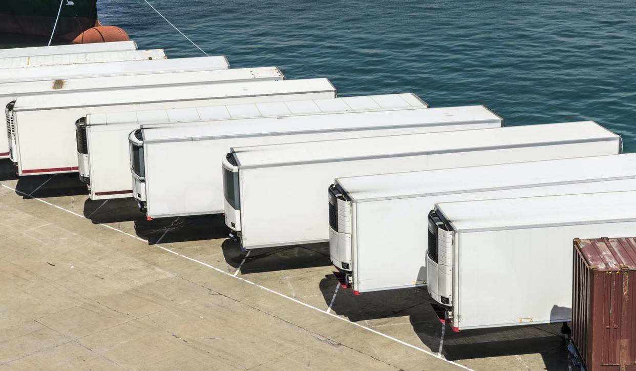 <span class="caption">Trucks, planes and storage facilities all need to be able to keep a vaccine cold.</span> <span class="attribution"><a class="link " href="https://www.gettyimages.com/detail/photo/refrigerated-containers-royalty-free-image/475452834?adppopup=true" rel="nofollow noopener" target="_blank" data-ylk="slk:J2R/iStock via Getty Images Plus;elm:context_link;itc:0;sec:content-canvas"> J2R/iStock via Getty Images Plus</a></span>