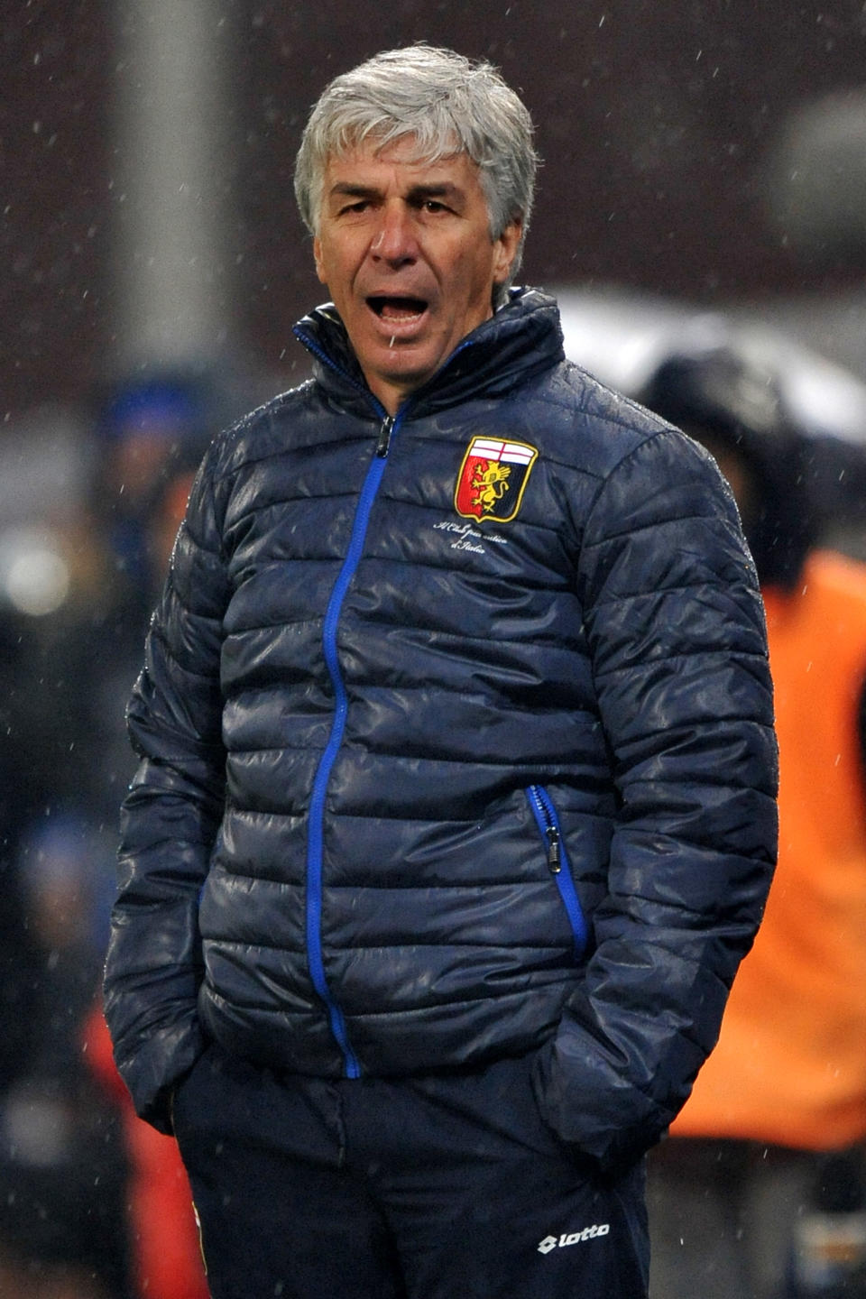 Genoa coach Gian Piero Gasperini calls out to his players during a Serie A soccer match between Genoa and Sampdoria, in Genoa's Luigi Ferraris Stadium, Italy, Monday, Feb. 3, 2014. (AP Photo/Tano Pecoraro)