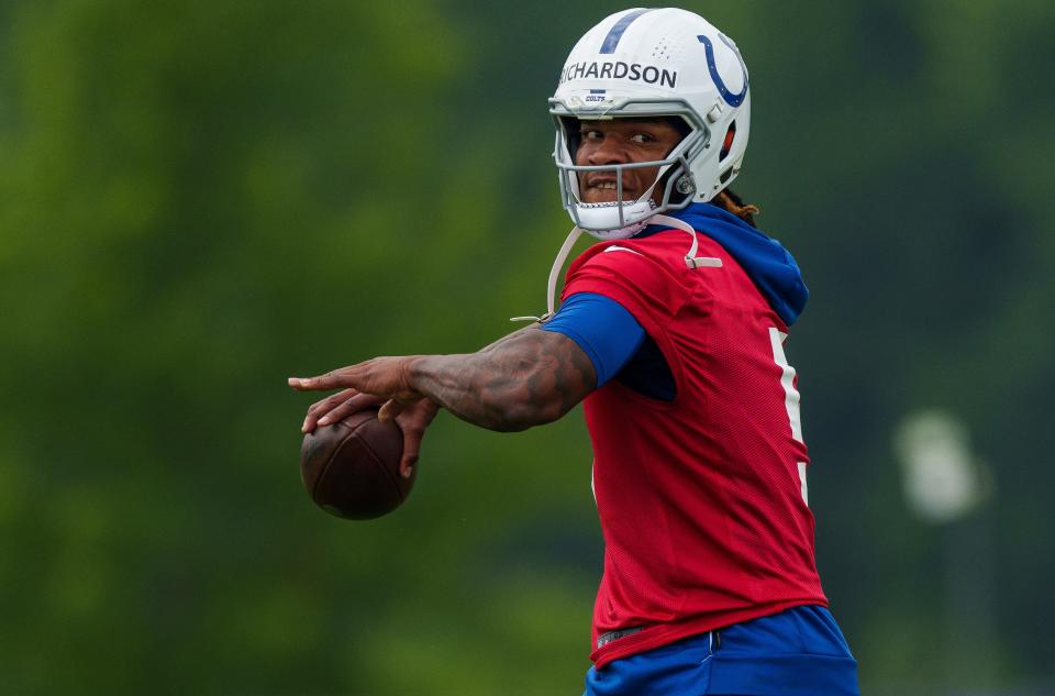 Indianapolis Colts quarterback Anthony Richardson (5) works through passing drills June 14 during mandatory minicamp at the Indiana Farm Bureau Football Center in Indianapolis.