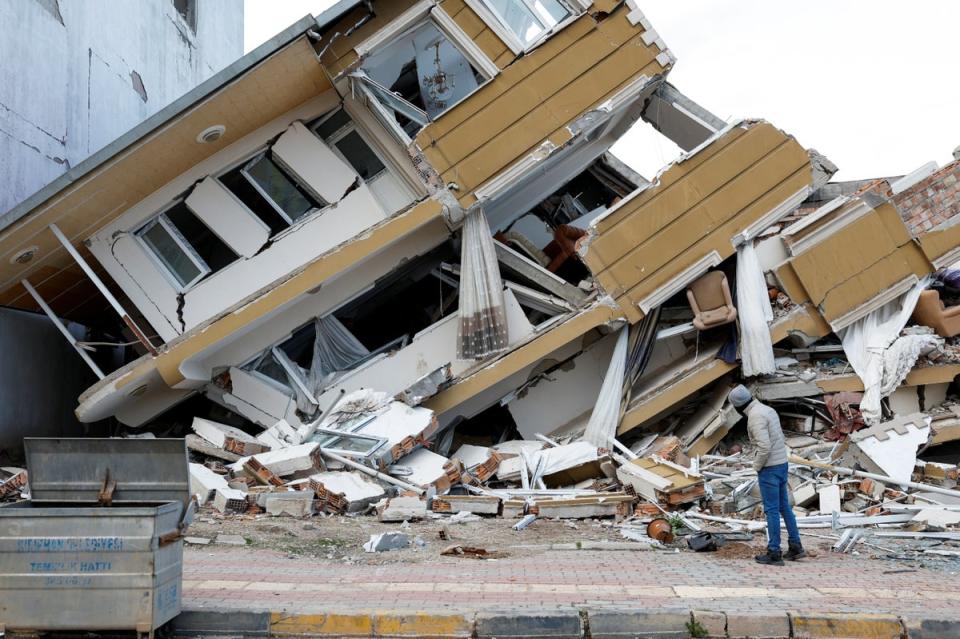 A view shows a collapsed building following an earthquake in Kirikhan, Hatay, Turkey, on February 7 (REUTERS)