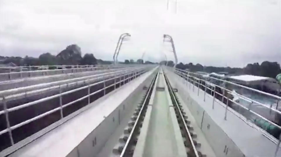 The train surfer filmed himself riding on the back of the train, clutching only to a windscreen wiper. Source: 7 News