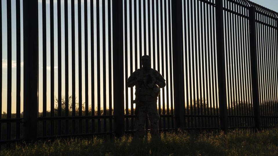 A National Guard soldier oversees an area where the border wall ends in Del Rio, on Nov. 7, 2021. (Verónica G. Cárdenas for ProPublica/The Texas Tribune)