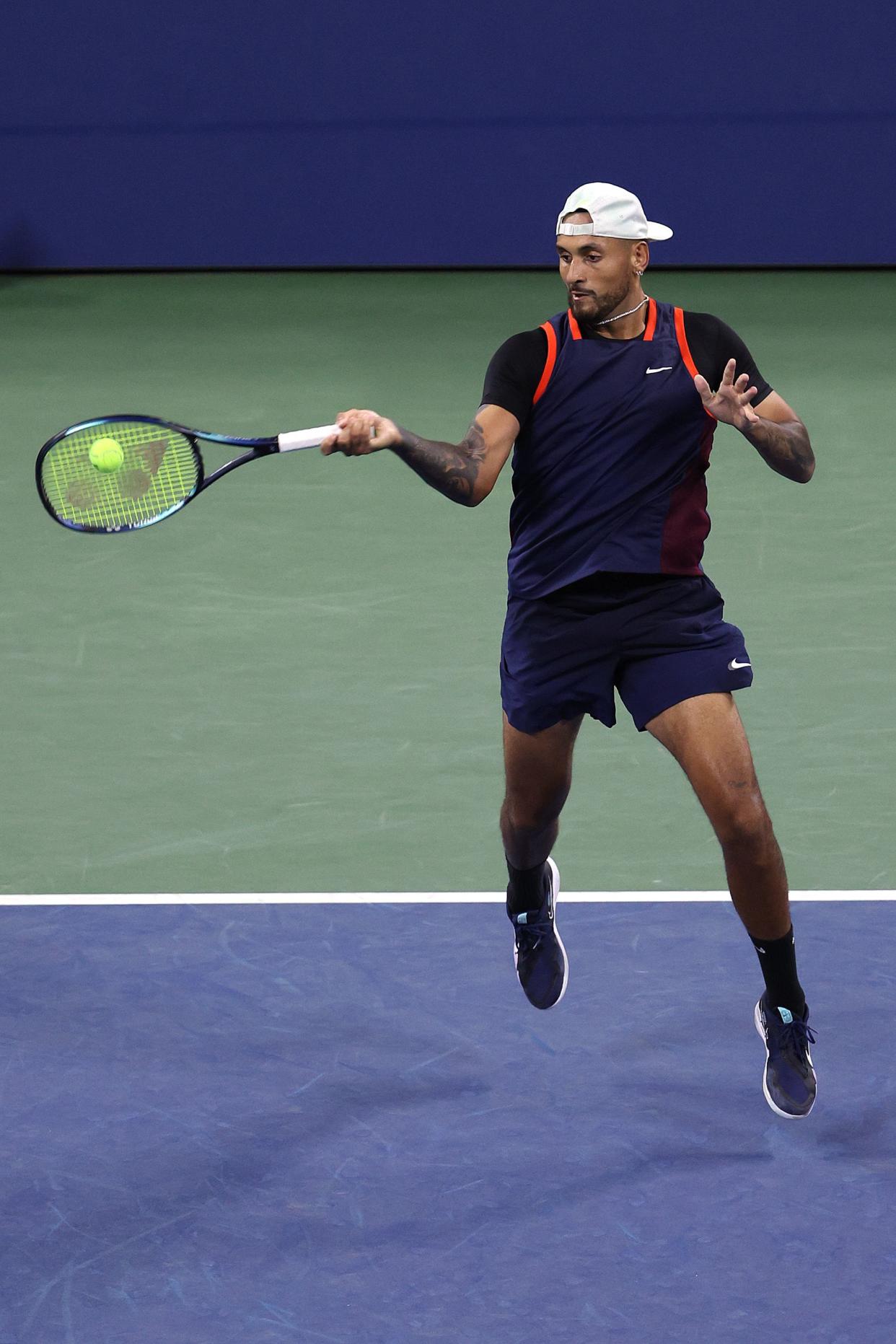 Nick Kyrgios of Australia plays a forehand against J.J. Wolf of the United States during their Men's Singles Third Round match on Day 5 of the 2022 U.S. Open at USTA Billie Jean King National Tennis Center on Sept. 02, 2022, in Flushing, Queens.